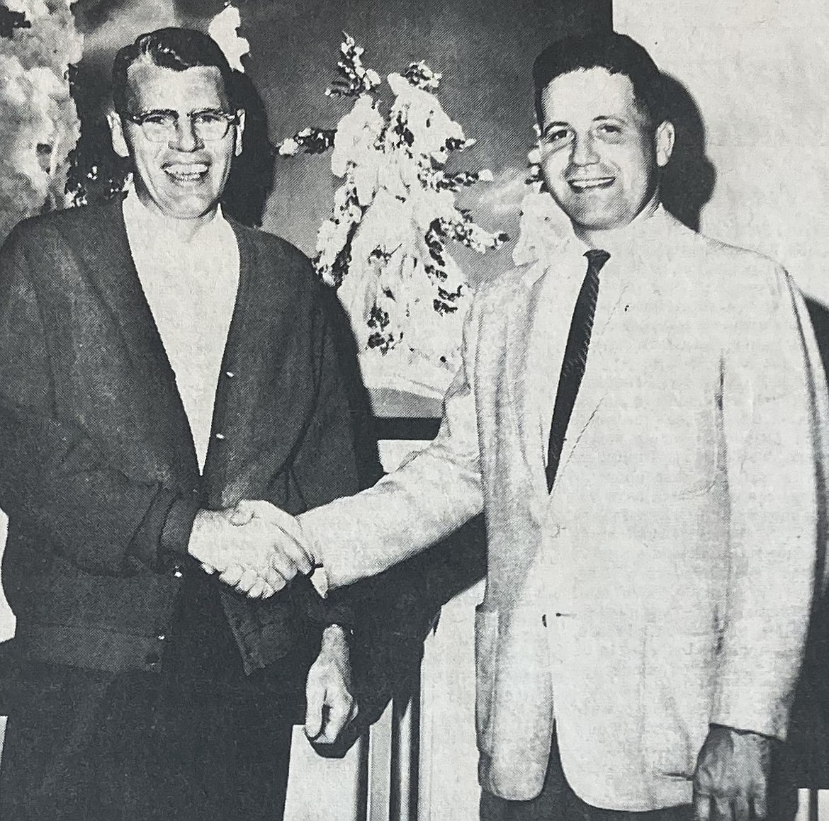 In 1964, Prosecutor William Reagan, left, shook hands with Pat Arney.