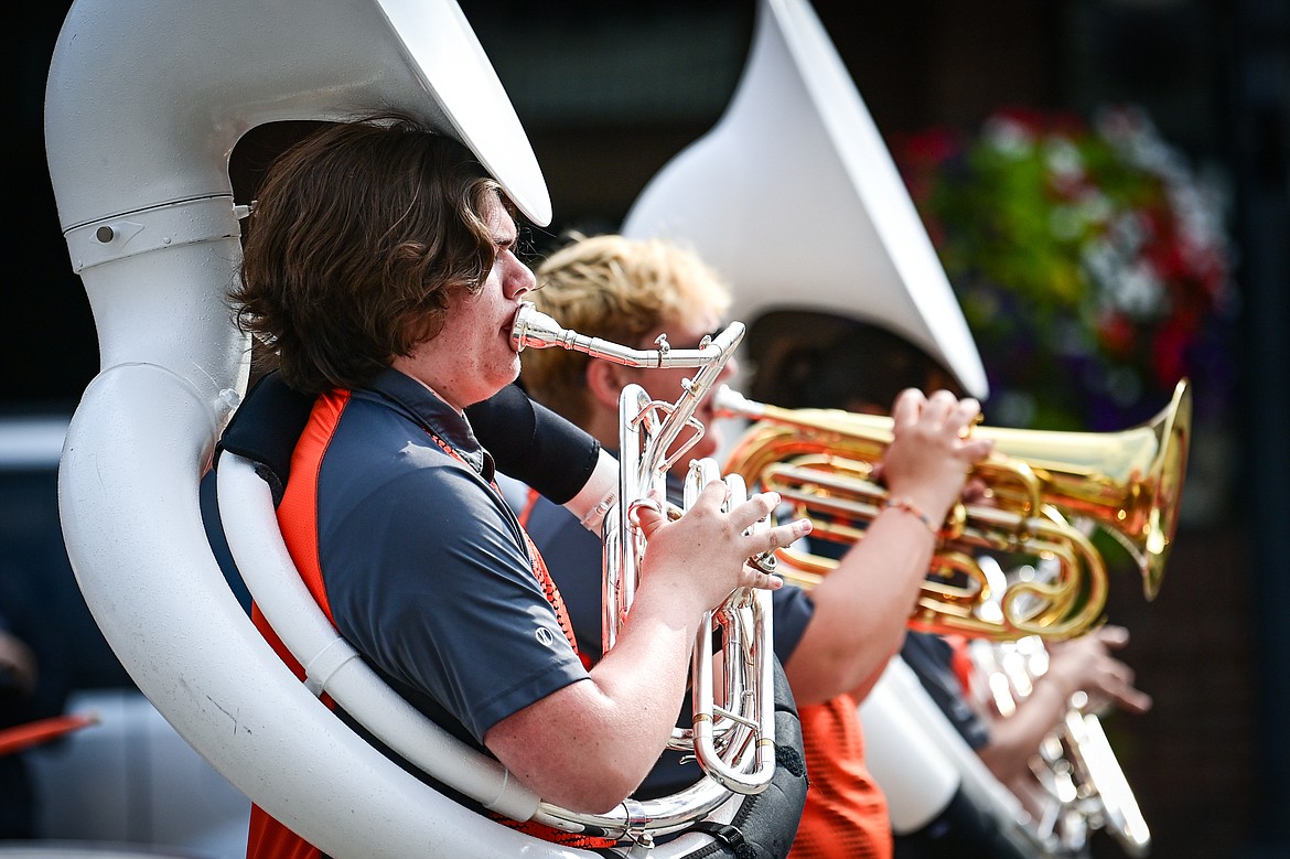 Members of the Flathead High School Marching Band perform during the Northwest Montana Fair Parade in Kalispell on Friday, Aug. 9. (Casey Kreider/Daily Inter Lake)