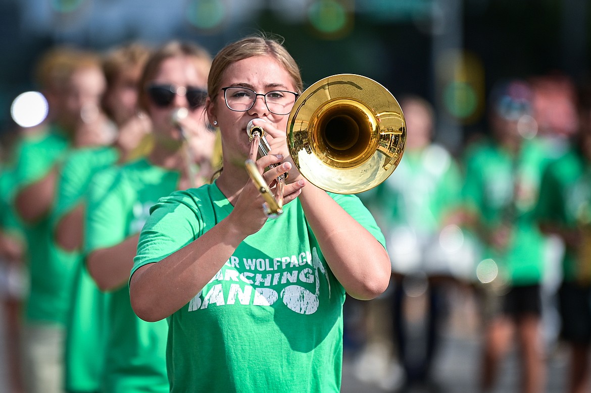 Members of the Glacier Wolfpack Marching Band perform during the Northwest Montana Fair Parade in Kalispell on Friday, Aug. 9. (Casey Kreider/Daily Inter Lake)