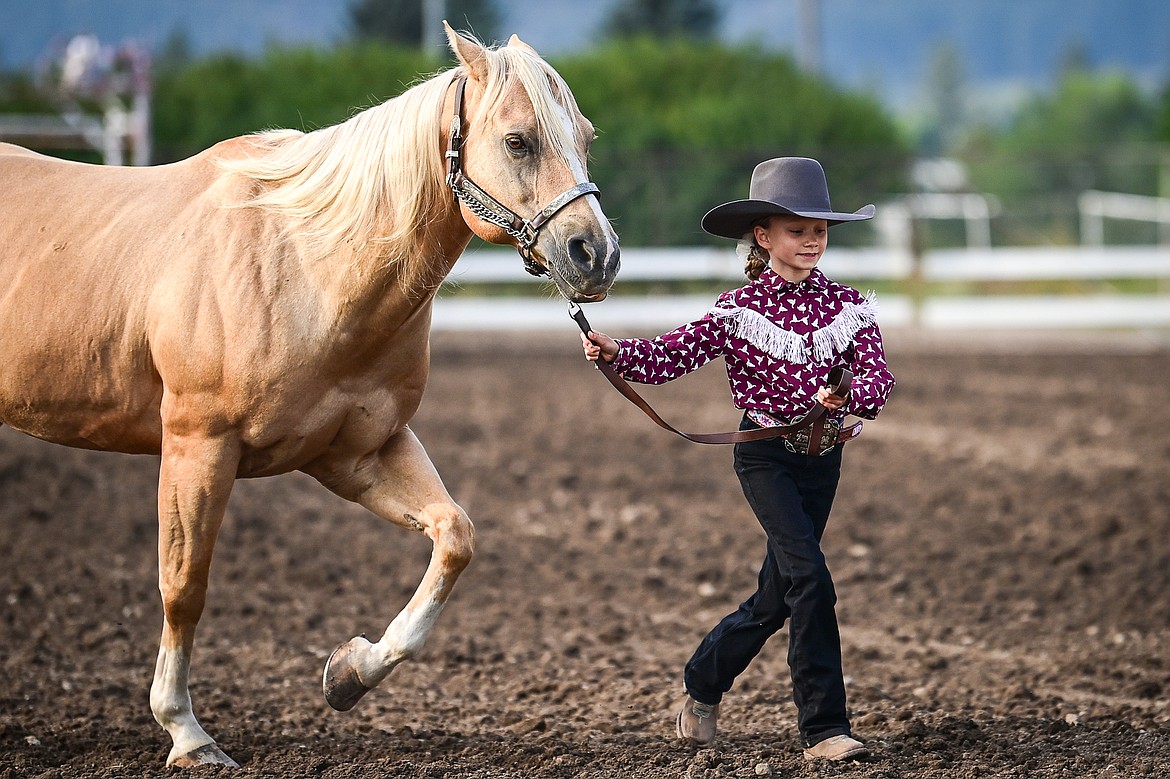 Kashlynn Knodel leads her horse through the pattern during pre-junior level showmanship at the 4H Horse Show at the Northwest Montana Fair on Saturday, Aug. 10. (Casey Kreider/Daily Inter Lake)