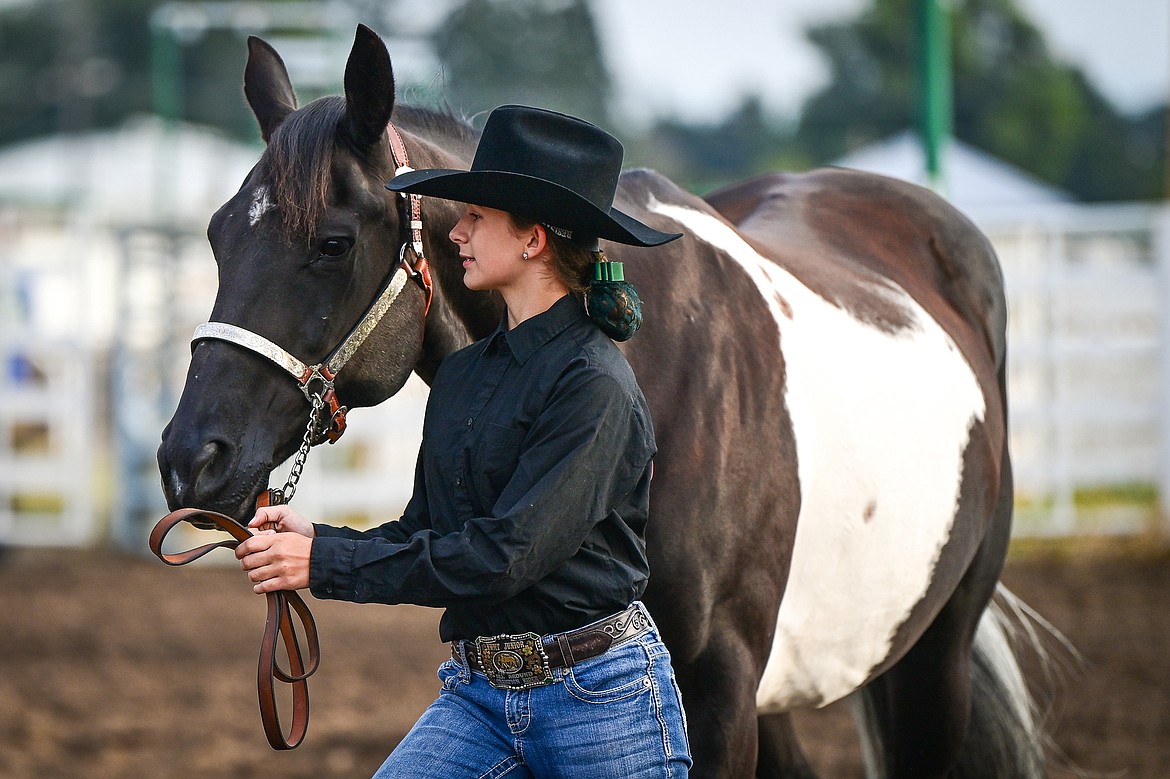 Kambrie Steward leads her horse through the pattern during junior level showmanship at the 4H Horse Show at the Northwest Montana Fair on Saturday, Aug. 10. (Casey Kreider/Daily Inter Lake)