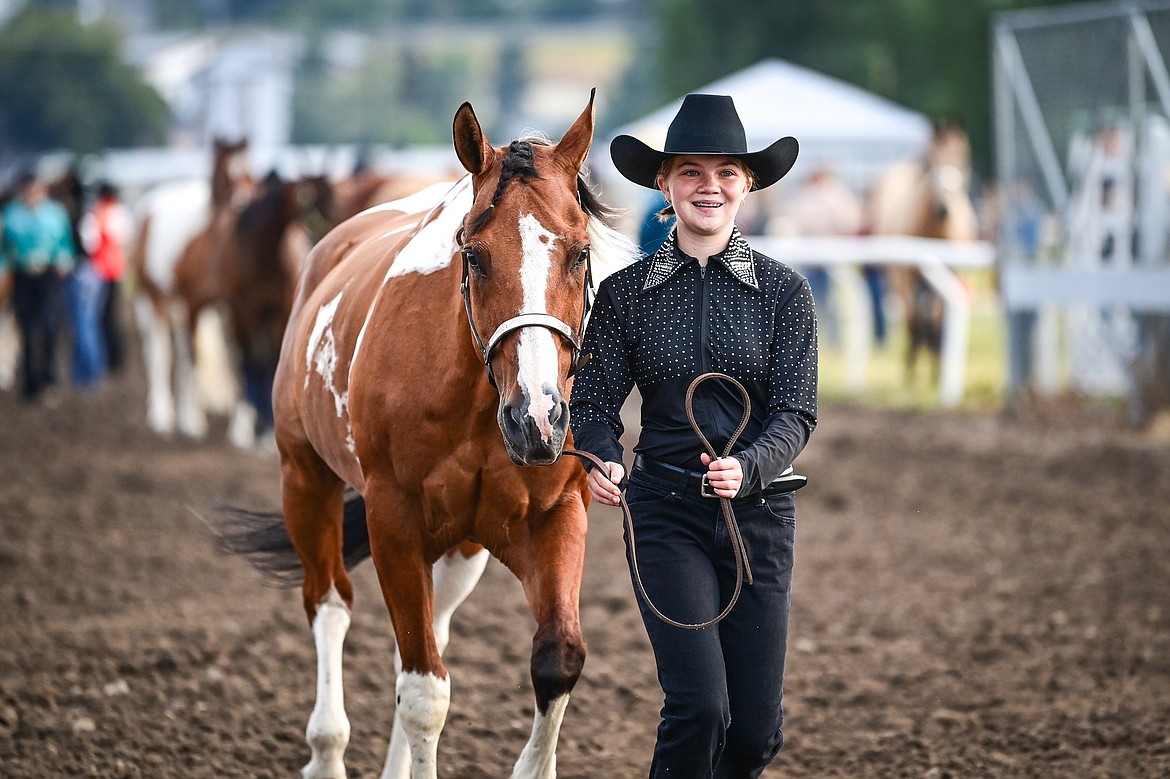 Addy Aiken leads her horse through the pattern during junior level showmanship at the 4H Horse Show at the Northwest Montana Fair on Saturday, Aug. 10. Aiken won grand champion in her division. (Casey Kreider/Daily Inter Lake)