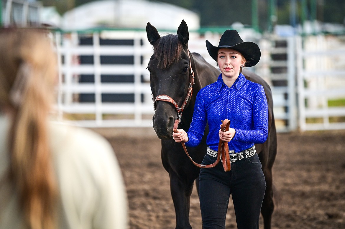 Brynn Mason leads her horse through the pattern during senior level showmanship at the 4H Horse Show at the Northwest Montana Fair on Saturday, Aug. 10. (Casey Kreider/Daily Inter Lake)