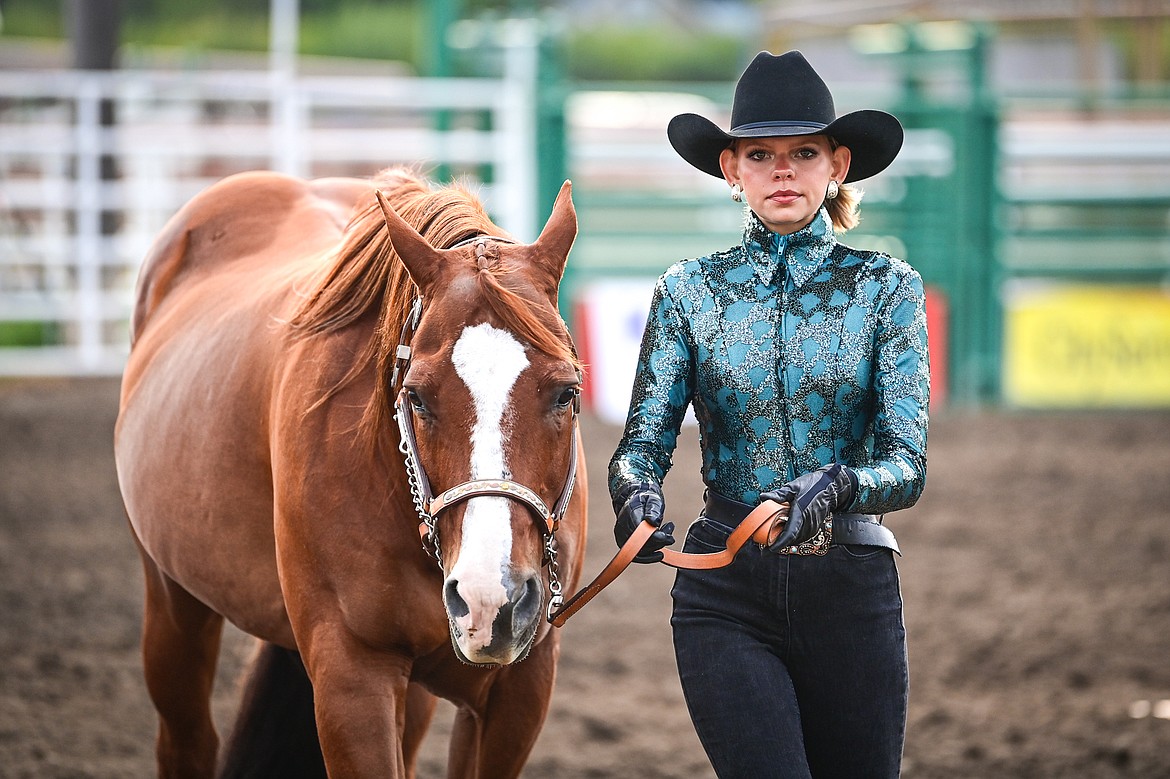 Quindy Gronley leads her horse through the pattern during senior level showmanship at the 4H Horse Show at the Northwest Montana Fair on Saturday, Aug. 10. Gronley won grand champion in her division. (Casey Kreider/Daily Inter Lake)