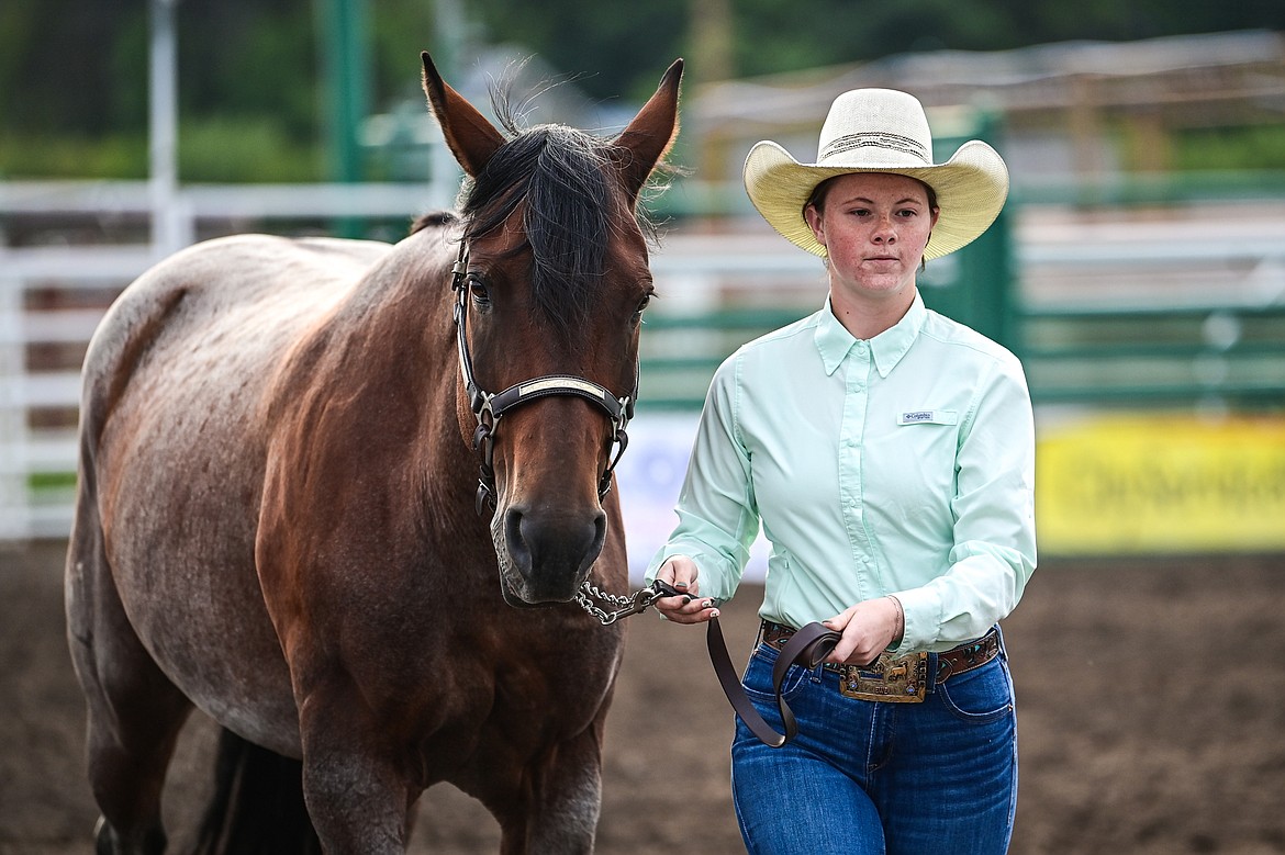 McKinley Bean leads her horse through the pattern during senior level showmanship at the 4H Horse Show at the Northwest Montana Fair on Saturday, Aug. 10. (Casey Kreider/Daily Inter Lake)