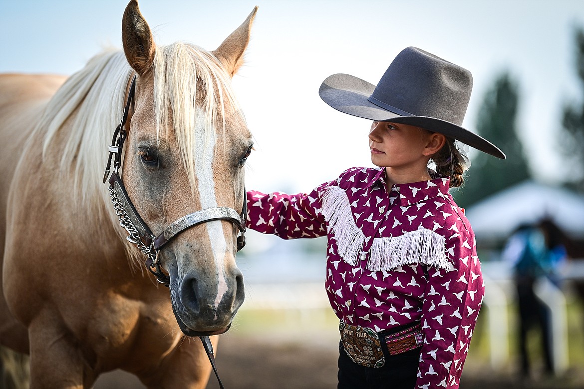 Kashlynn Knodel waits to show her horse during pre-junior level showmanship at the 4H Horse Show at the Northwest Montana Fair on Saturday, Aug. 10. (Casey Kreider/Daily Inter Lake)