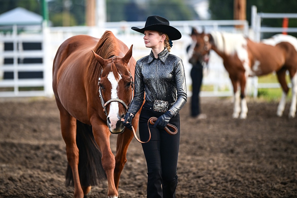 Raya Gronley leads her horse through the pattern during junior level showmanship at the 4H Horse Show at the Northwest Montana Fair on Saturday, Aug. 10. (Casey Kreider/Daily Inter Lake)