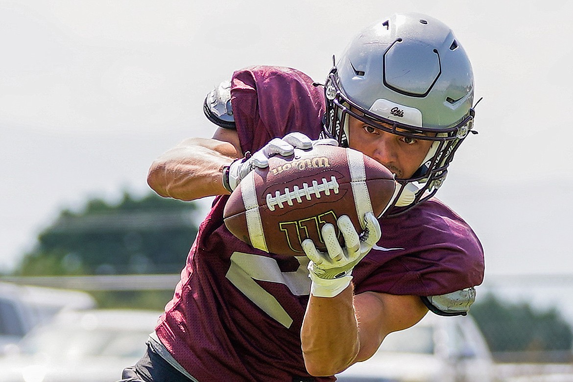 MONTANA GRIZZLIES receiver Drew Deck catches a pass during fall camp practice at the South Campus Fields on Thursday. (Montana Athletics/Coral Scoles-Coburn)