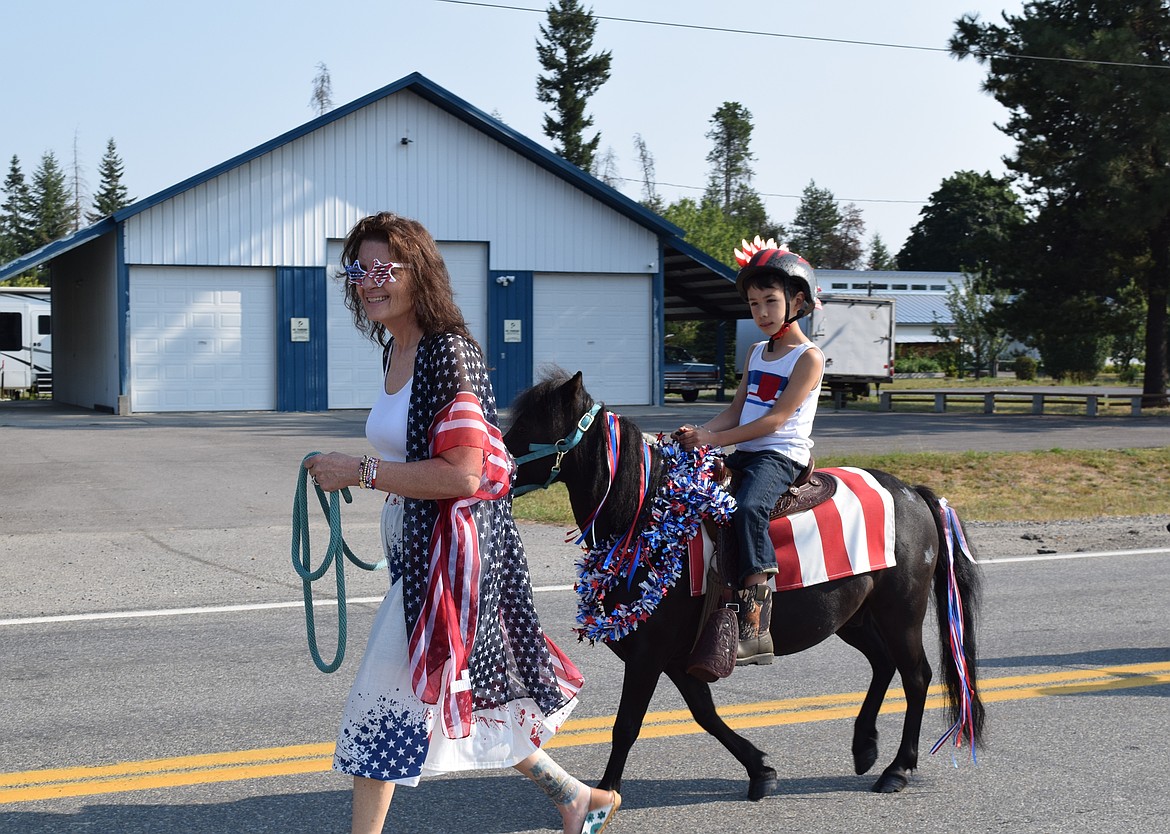 Romana Grissom and Jack Thomason show off their American spirit during the Athol Daze Parade.