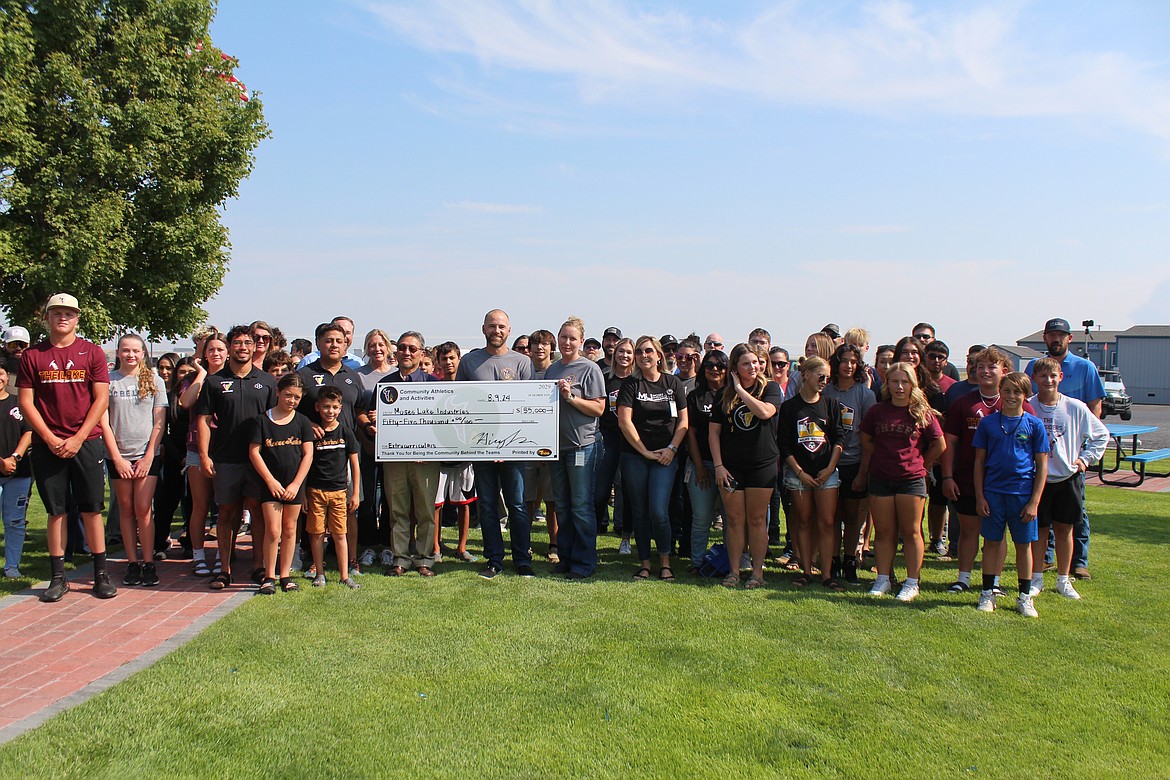 Student participants express their appreciation in person for a donation from Moses Lake Industries Friday afternoon.