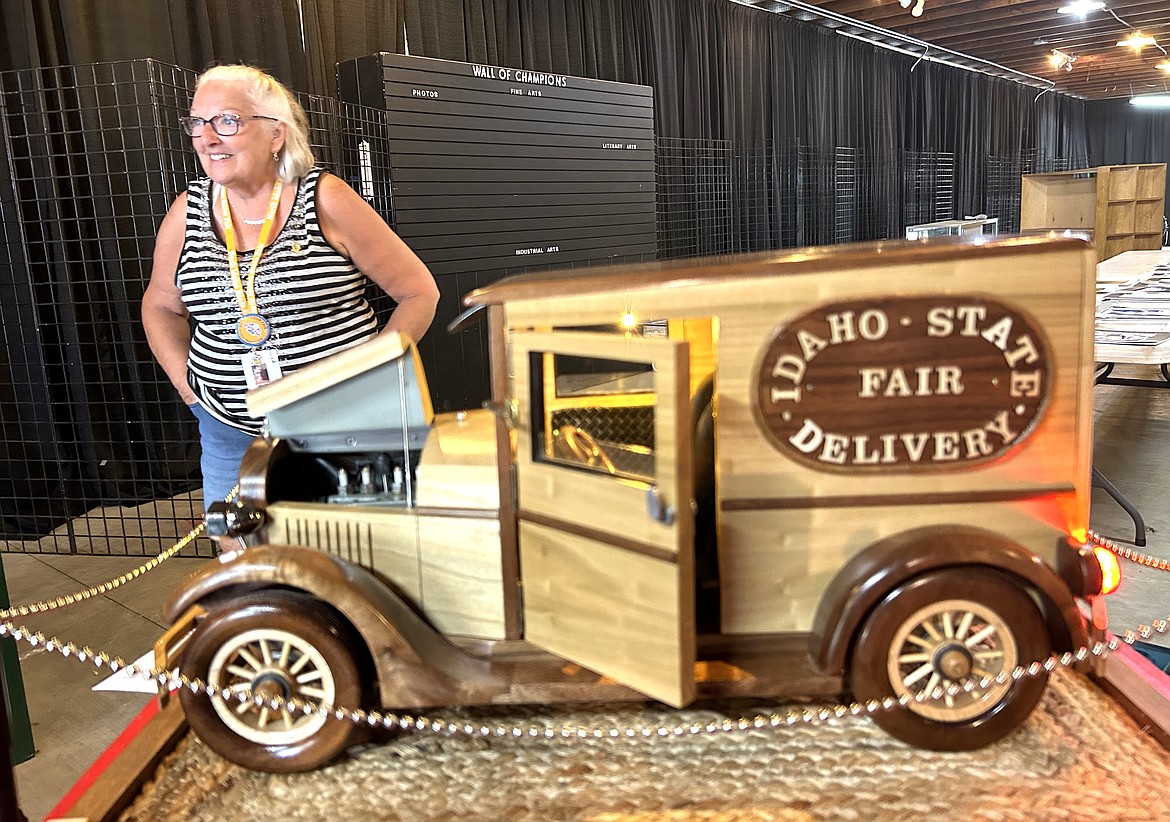 Elaine Cook smiles during a set-up day for the North Idaho State Fair.