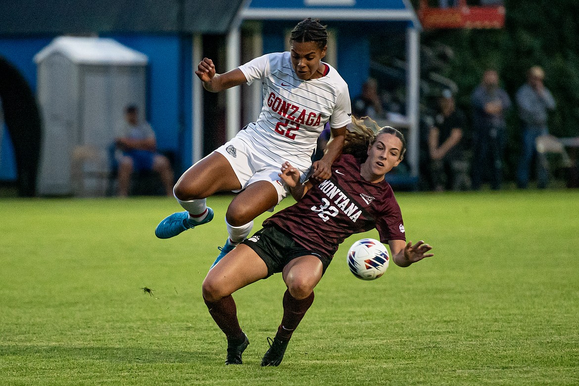 Bulldog Alexis Parker and Grizzly Emma Windsor vie for control of the ball in the Gonzaga-Montana exhibition game in Columbia Falls Sunday, August 11. (Avery Howe/Bigfork Eagle)