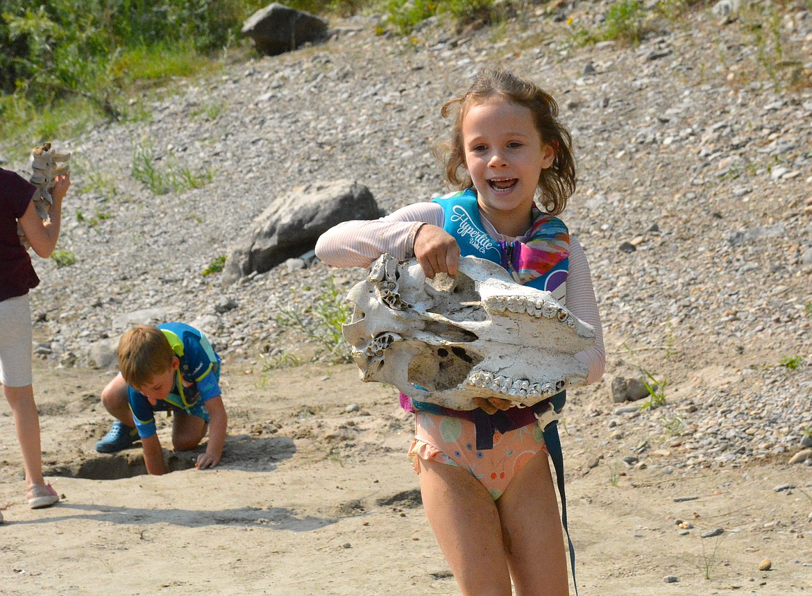 This young paleontologist was thrilled with her discovery from the Dino Dig event in Superior. She exclaimed running down the beach, "I found the head!" (Mineral Independent/Amy Quinlivan)