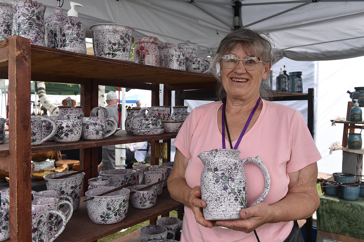 Judy Howell of Montana Earth Pottery in Columbia Falls said on Friday that she has had a booth at the Huckleberry Days Art Festival for about a decade. (Kelsey Evans/Whitefish Pilot)