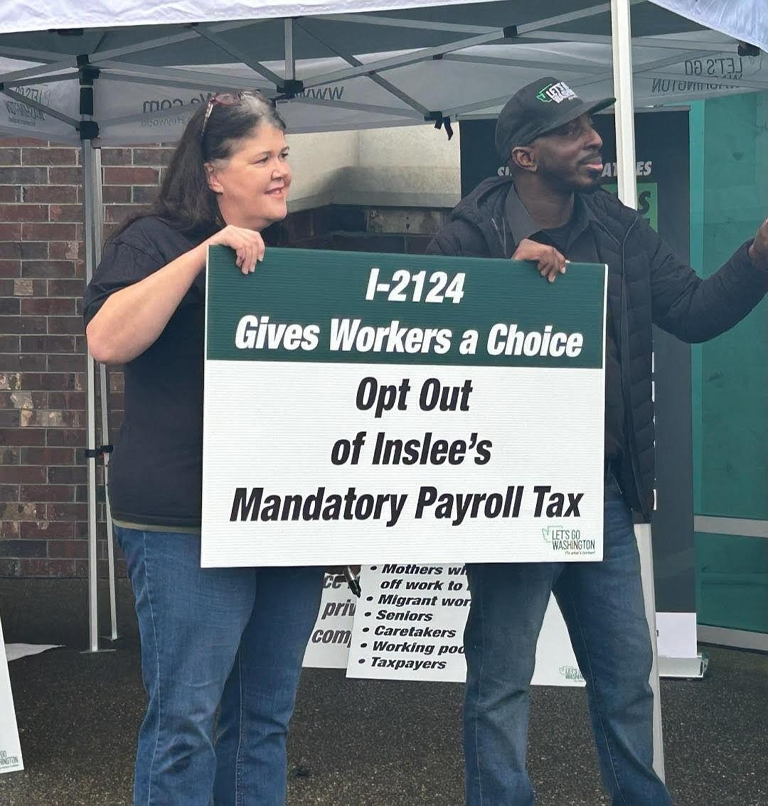 People show support for a Washington ballot initiative that would make participation in a state-run long-term care program optional. The Washington State Supreme Court threw out a suit to invalidate I-2124 and three other initiatives, a suit the initiatives' supporters say they had no idea had even been filed.