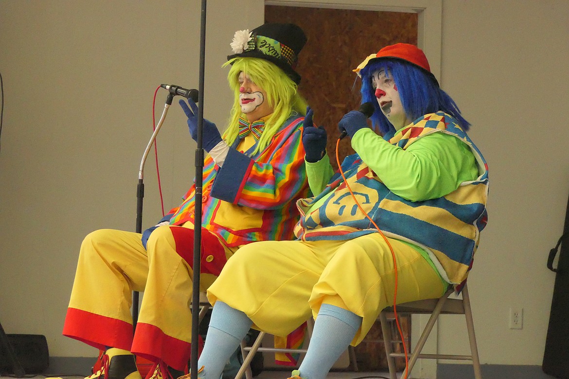 Clowns took over the main stage at the Huckelberry Festival under the parachute canopy at the main stage. (Chuck Bandel/VP-MI)