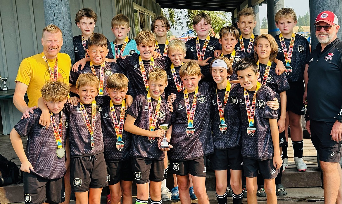 Courtesy photo
The Sting Soccer Club 2012 boys Academy team took second place last weekend at the Northwest Cup in Spokane. In the front row from left are Connor McKenna, Blake Cline, Jimmy Greene, Mason Fantozzi, Colin Hutchins, Alister Campbell, Henry Bowlby and assistant coach Robin Bundy; middle row from left, assistant coach Scott McNiel, Zeek McNiel, Sander Bundy, Micah Brumbach, Breesen Ellis and Camden Nelson; and back row from left, Evan Peak, Cooper Nusser, Jake Young, Ben Thomas, Kai Peraldo and Max Shaporda. Not pictured is coach Nick Funkhouser.