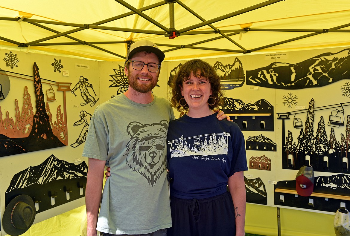 Nathan Stoltzfus and Kelsey Holmes of Creative Combinations make one-of-a-kind functional art pieces out of metal with wood, and new and old materials at their shop in Columbia Falls. (Kelsey Evans/Whitefish Pilot)