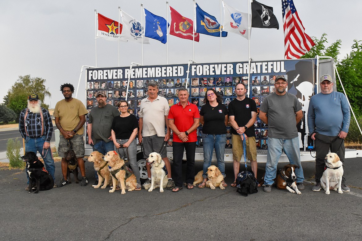 There were nine sets of veterans with their Battle Buddies at the fundraiser in Ephrata Saturday. Center, in the red shirt, is NWBB COO/Chief Advancement Officer Ovie Muntean.