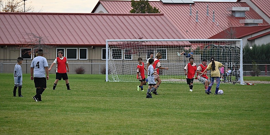 Players take the field during Universe Soccer Academy’s fall league last year. The league is returning this fall, beginning on Sept. 5.