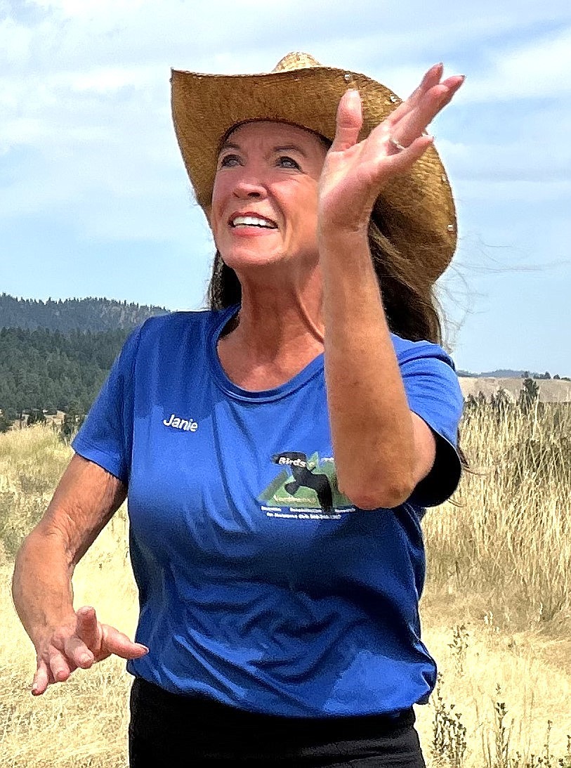 Jane Veltkamp waves goodbye to a red-tailed hawk on Tuesday.