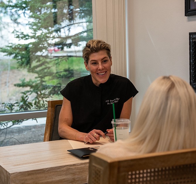 Dr. Christina Fisher of Northwest Integrated Health visits with a client. Voted the North Idaho Business Journal Best Of 2024's best holistic health care clinic, Northwest Integrated Health offers a variety of treatments and services that focus on preventing illness and caring for the whole person rather than treating symptoms of disease.