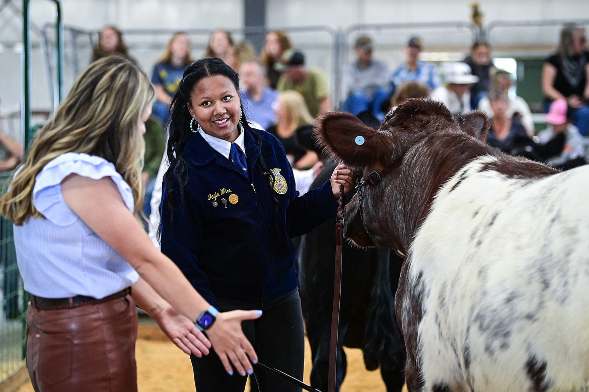 Jayla Wise speaks with judge Sierra Myers during senior beef cattle showmanship at the Northwest Montana Fair on Wednesday, Aug. 14. (Casey Kreider/Daily Inter Lake)