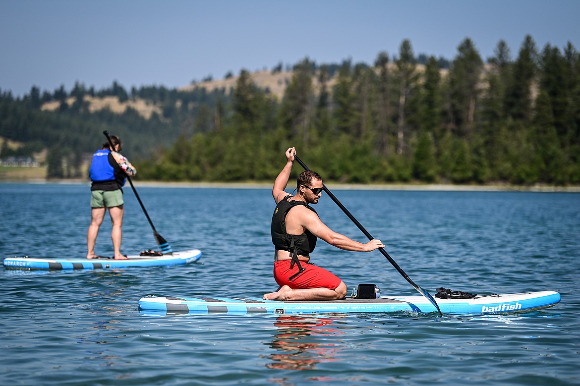 Paddleboarders head out onto Foys Lake on Thursday, Aug. 15. (Casey Kreider/Daily Inter Lake)