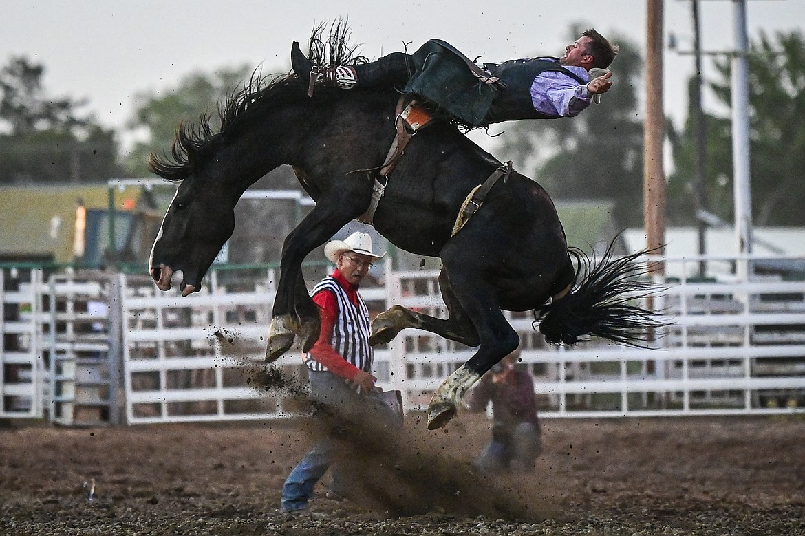 A horse and rider compete in bareback riding during the PRCA Rodeo at the Northwest Montana Fair & Rodeo on Thursday, Aug. 15. (Casey Kreider/Daily Inter Lake)