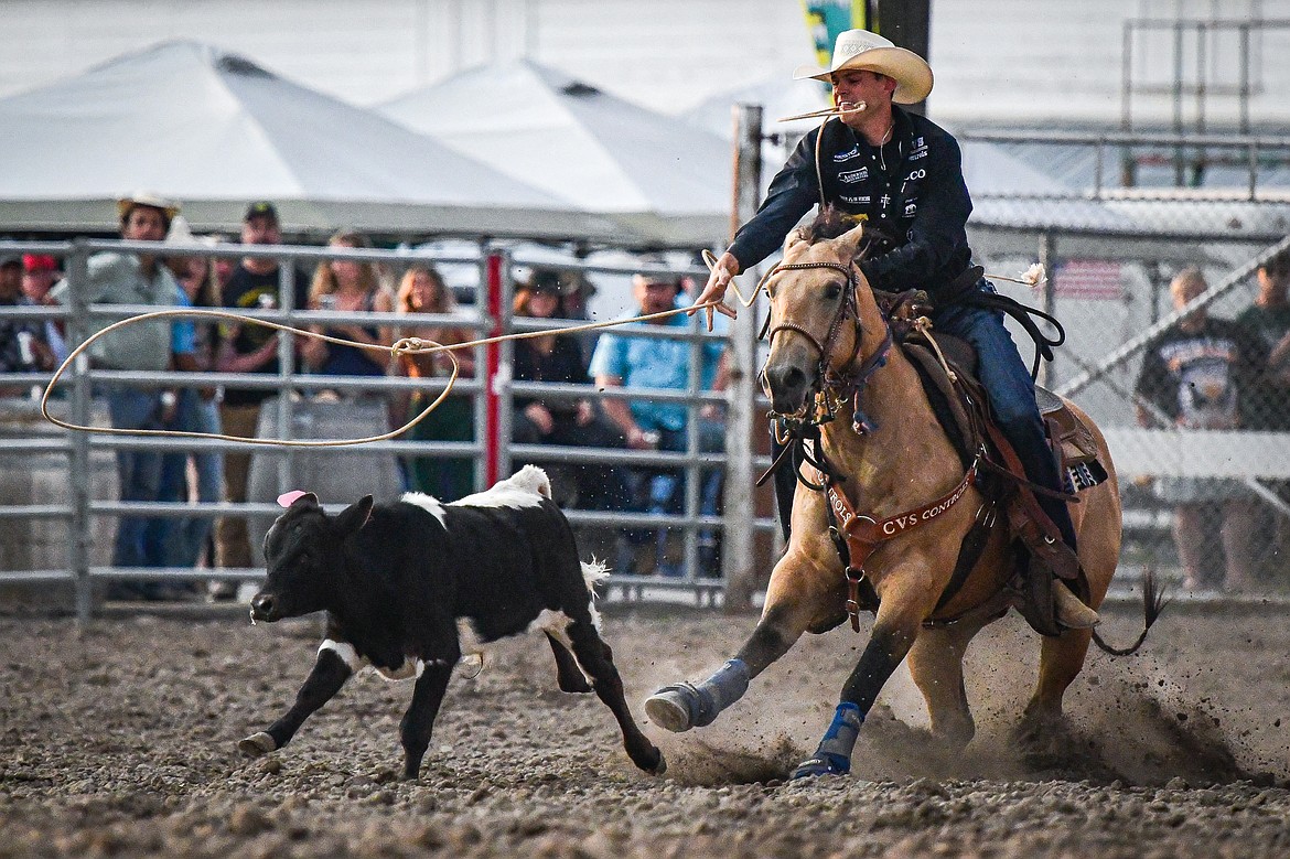 Bode Scott, from Pryor, ropes his calf during tie down roping at the PRCA Rodeo at the Northwest Montana Fair & Rodeo on Thursday, Aug. 15. (Casey Kreider/Daily Inter Lake)