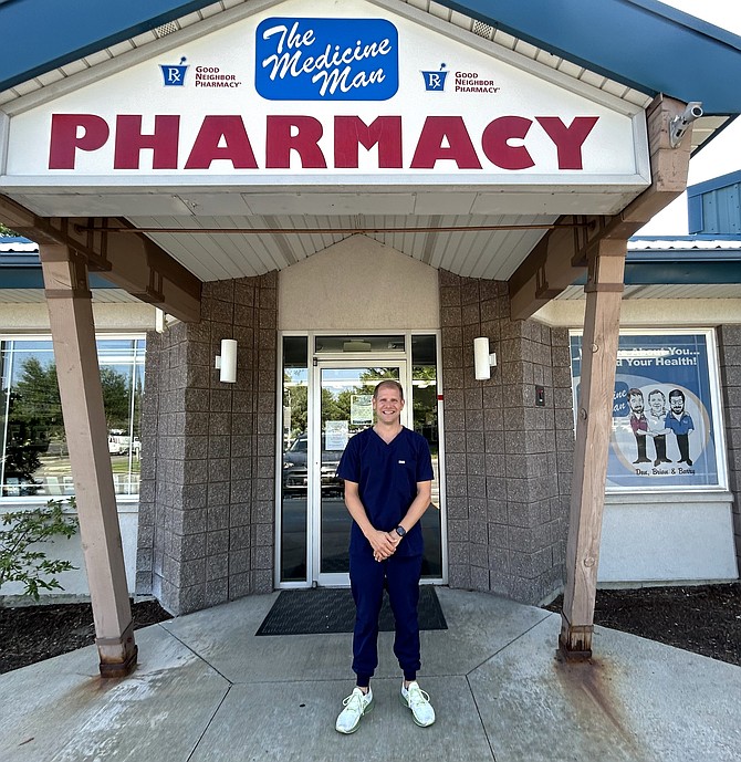 Korey Kreider, co-owner of Medicine Man Pharmacy, stands in front the store in Hayden off Prairie Avenue.