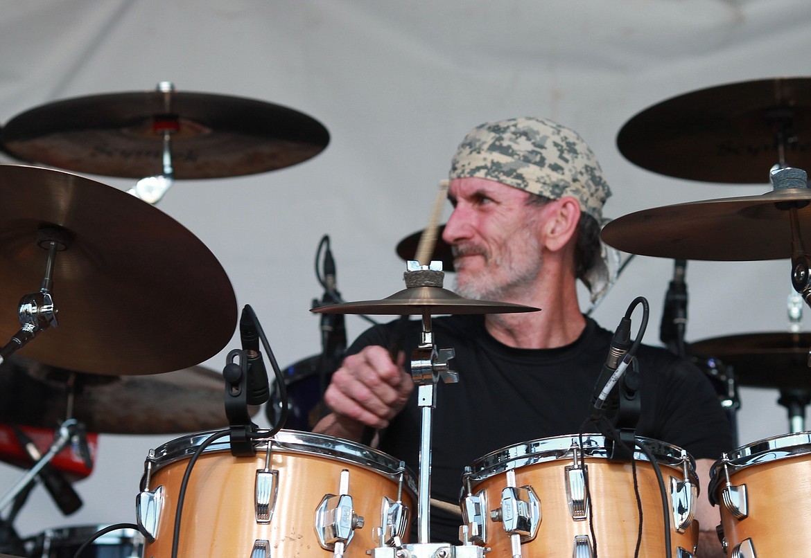 Mike Caliandro, the drummer for Crazy Train, an Ozzy Osbourne tribute band, bangs the drums on stage at the Grant County Fair. “Winning countless percussion wards, along with teaching percussion to a national class drum corps, Mike has no problem driving the tunes where they need to go,” reads his bio on the band’s website.