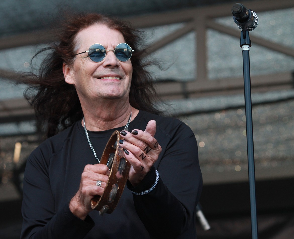 Vinny Cormier, the lead singer of Crazy Train, an Ozzy Osbourne tribute band, plays his tambourine during the Grant County Fair on Wednesday. According to their website, Cormier has worked with acts such as Molly Hatchet, Eddie Money, Blue Oyster Cult and more.