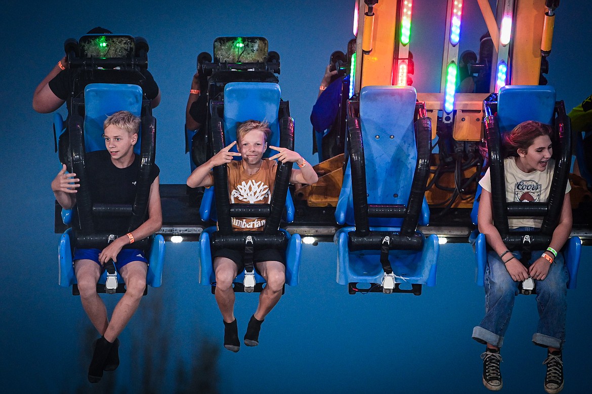 Riders enjoy the Frenzy ride at the carnival at the Northwest Montana Fair & Rodeo on Thursday, Aug. 15. (Casey Kreider/Daily Inter Lake)