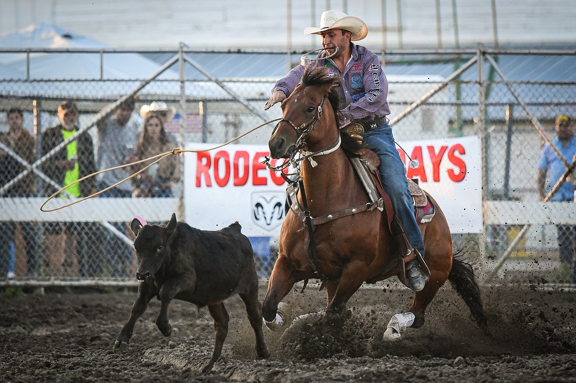 Haven Meged, from Miles City, ropes his calf during tie down roping at the PRCA Rodeo during the Northwest Montana Fair & Rodeo on Friday, Aug. 16. (Casey Kreider/Daily Inter Lake)