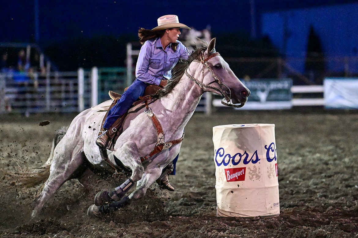 Shelby Gill, from Helena, competes in barrel racing at the PRCA Rodeo during the Northwest Montana Fair & Rodeo on Friday, Aug. 16. (Casey Kreider/Daily Inter Lake)