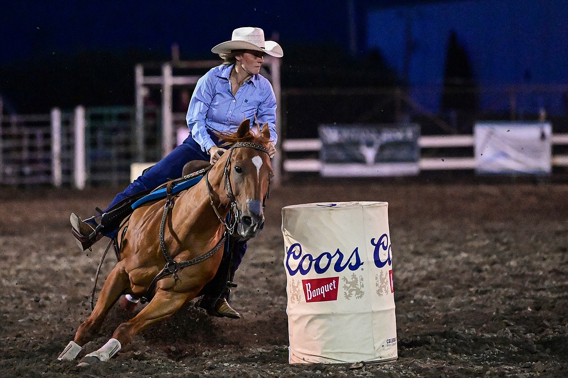 Alexandra White, from Columbia Falls, competes in barrel racing at the PRCA Rodeo during the Northwest Montana Fair & Rodeo on Friday, Aug. 16. (Casey Kreider/Daily Inter Lake)