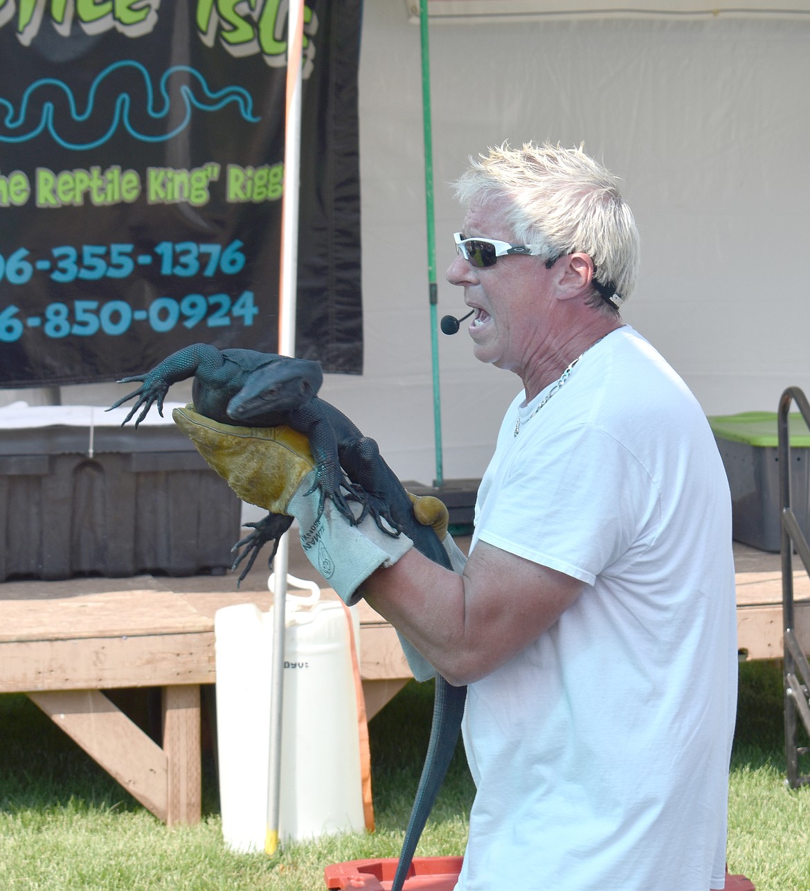 Don Riggs, billed as the Reptile King, shows Toothless the black dragon at his Reptile Isle show at the Grant County Fairgrounds last week. Toothless is one of only 250 of his kind in the world, up from four 11 years ago, Riggs said.