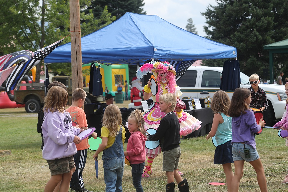 Pippi the Clown engages area youth in a game at the Bonner County Fair on Friday.