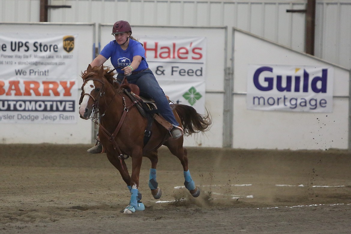 A rider with the Grant County Youth Equine Program competes in Friday’s keyhole races at the Hardwood Pavilion.