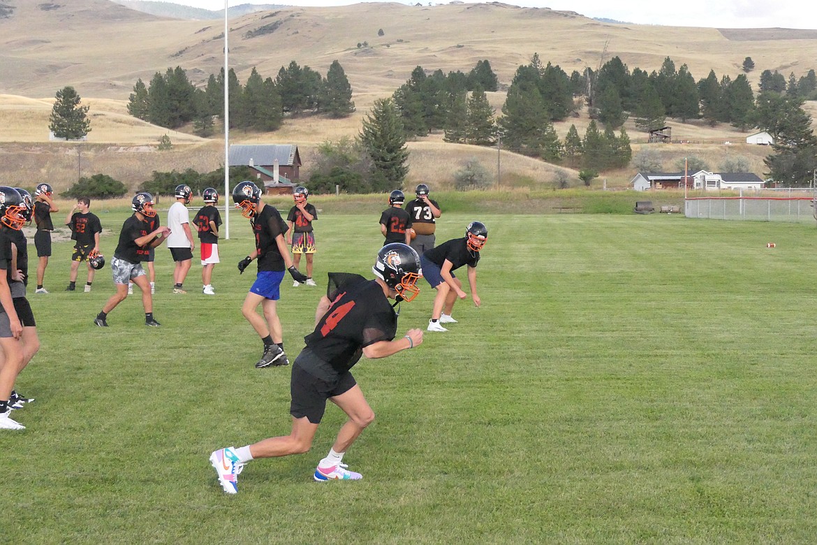 Horsemen wide receivers head downfield in a passing drill last week during the opening of the 2024 high school football season practice sessions. (Chuck Bandel/VP-MI)