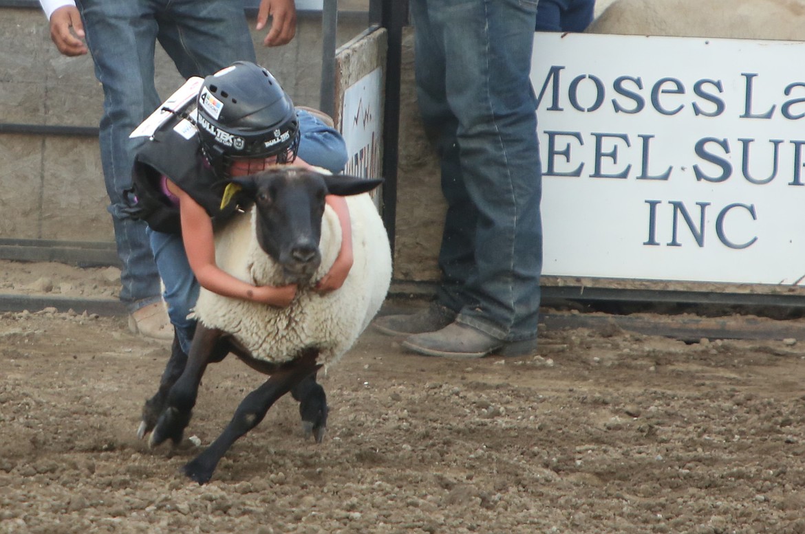 Pre-rodeo festivities at the Moses Lake Roundup featured Mutton Bustin', held before each performance Thursday through Saturday.