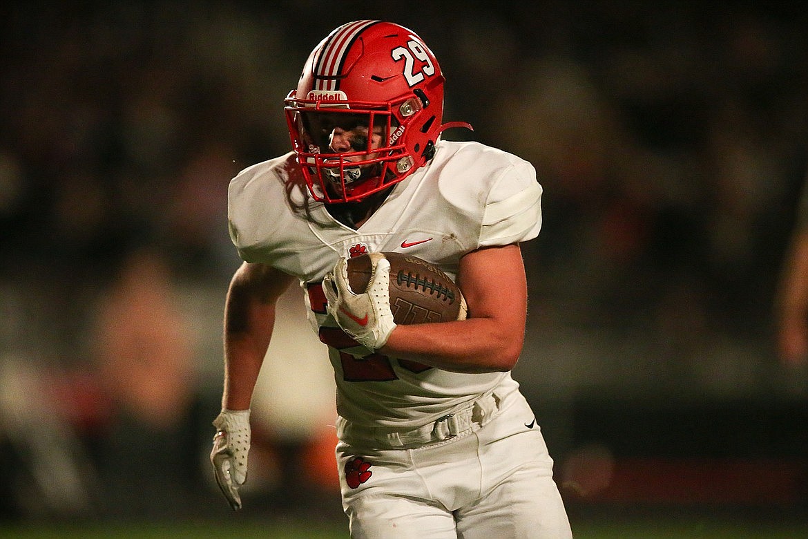 Sandpoint High senior Ashlei Hawkins breaks free for a big gain against Moscow last season.