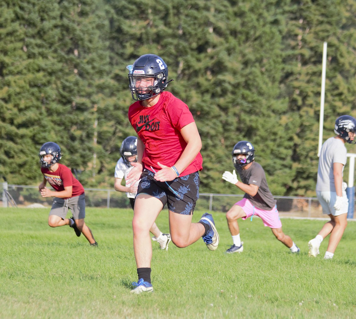 Bonners Ferry football player sprints for a conditioning drill.