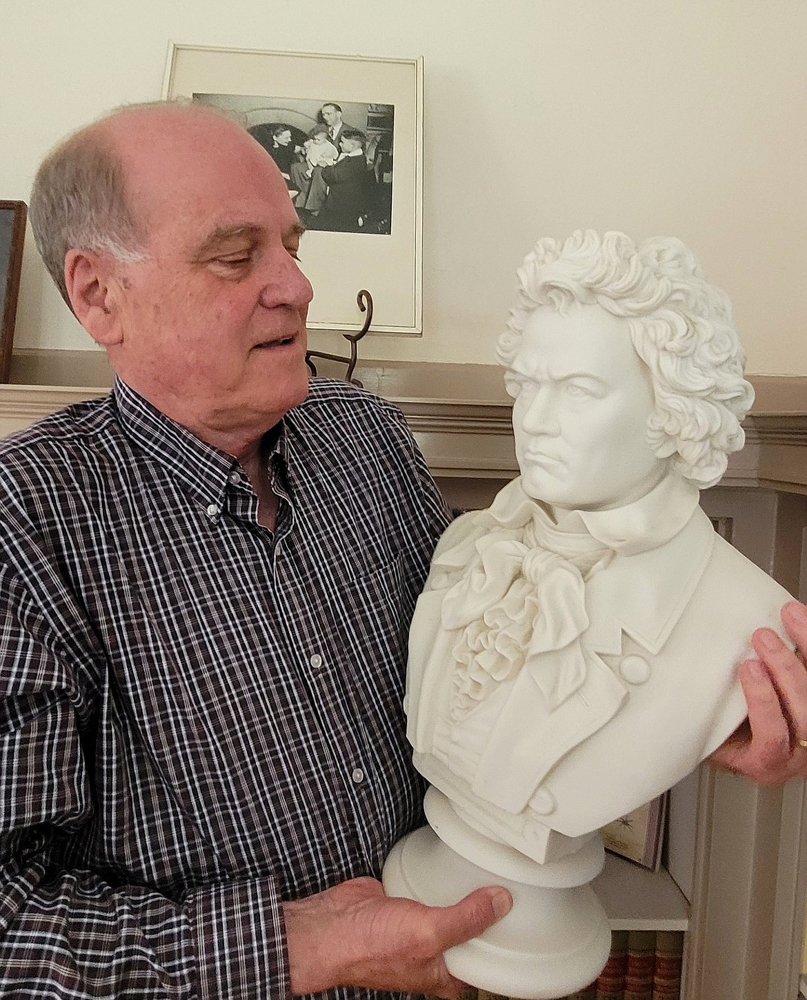 Kent Kimball on Monday holds a bust of Ludwig von Beethoven that was recently given as a gift to the Music Conservatory of Coeur d'Alene. The alabaster statue is mysterious in who carved it and exactly how old it is, although could be about 224 years old.