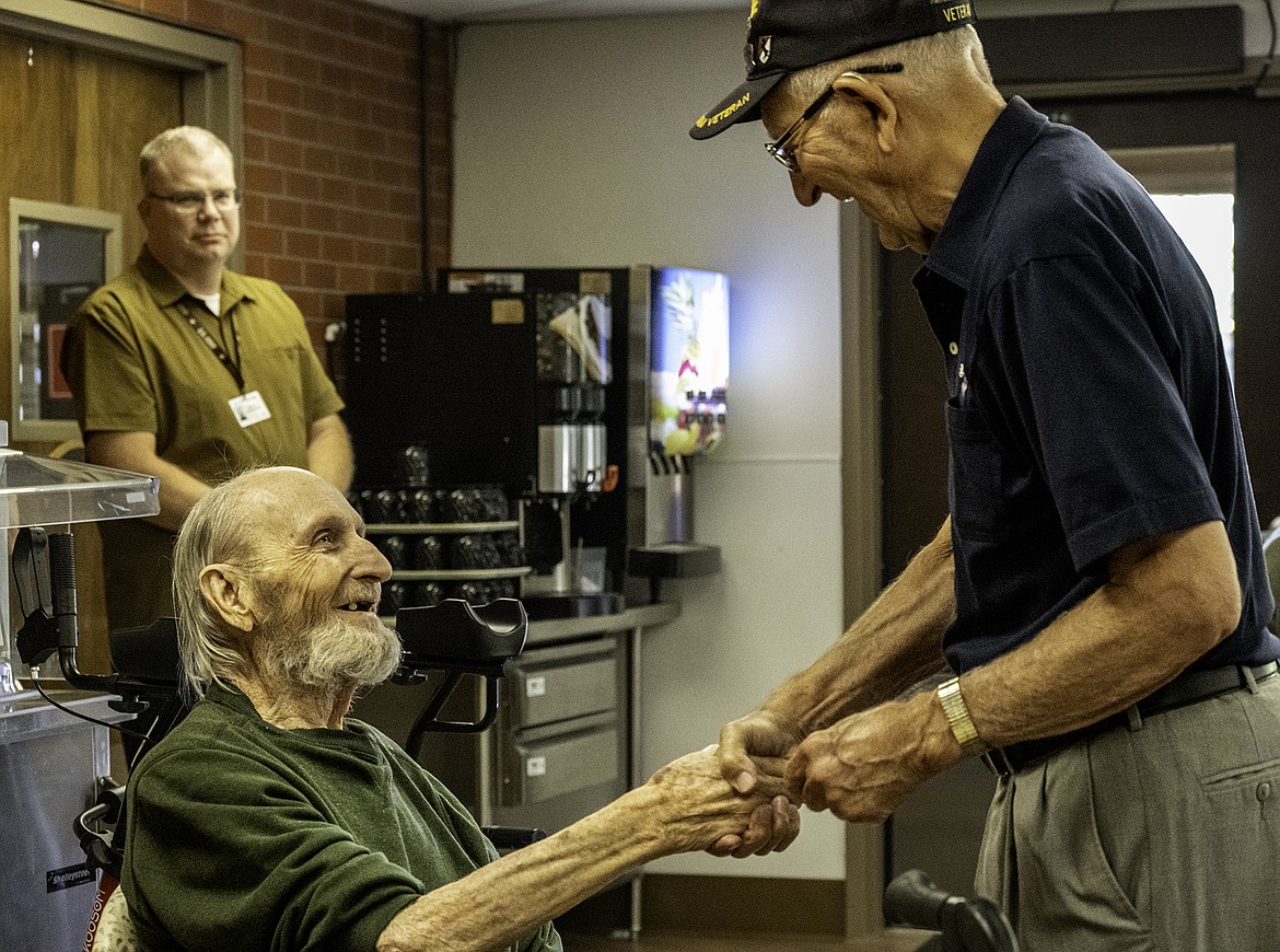 Ames Powell receives his Vietnam War pin commemorating his service. Montana Veterans Home. (Seth Anderson/Hungry Horse News)