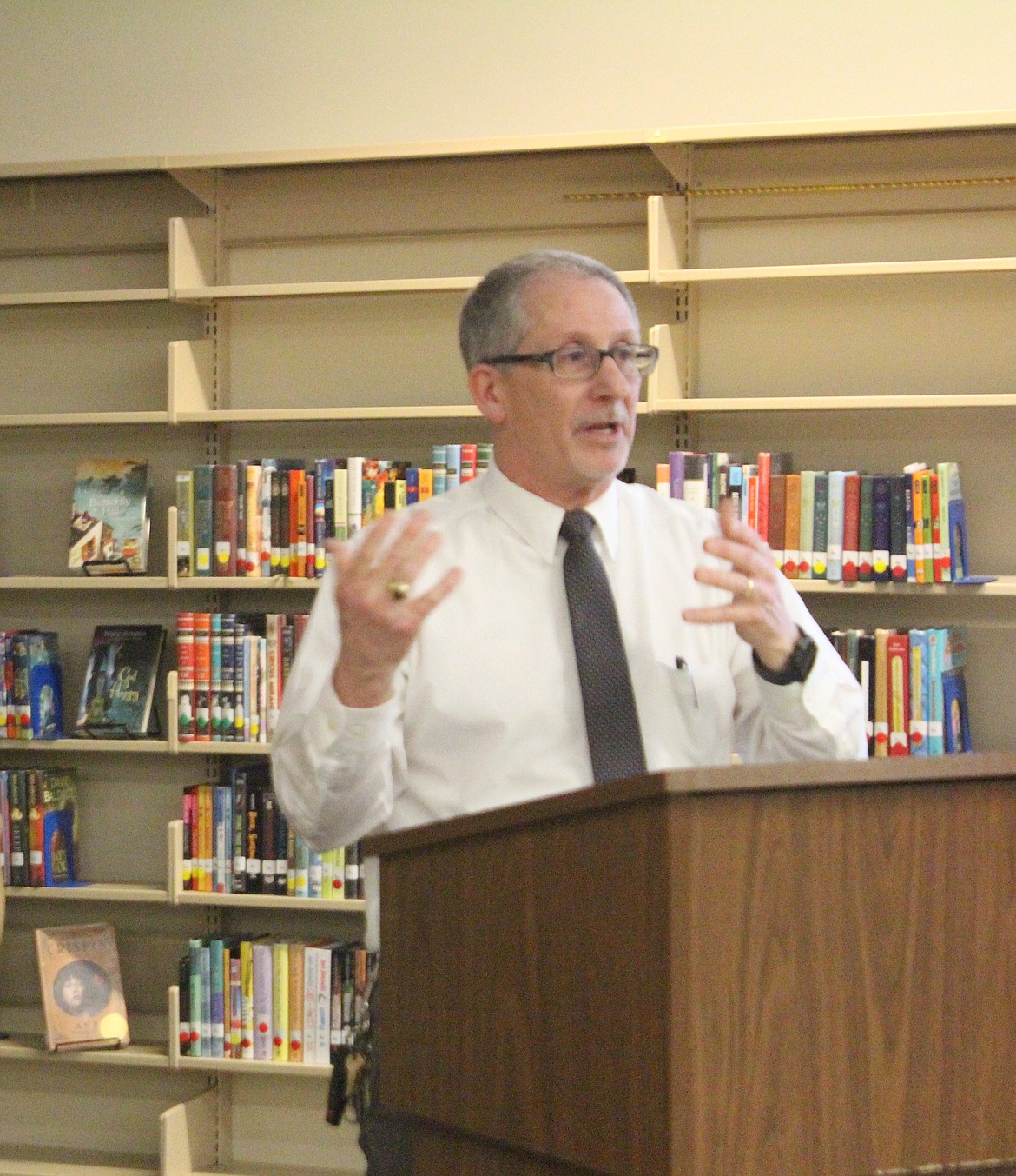 Quincy Middle School Principal Scott Ramsey, pictured at a February meeting, said a new policy governing cell phones is designed, in part, to reduce distractions in the classroom.