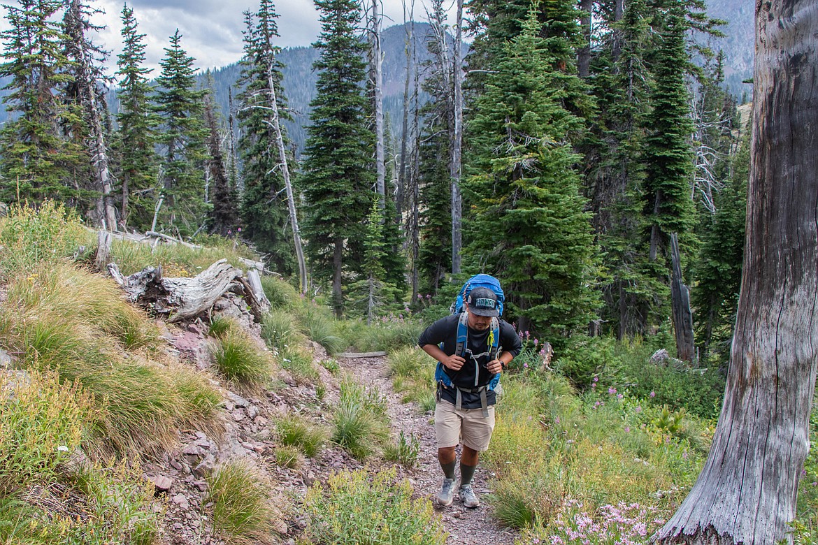 Ron Rydelle Ramos, from Hawaii, on a backpacking trip in the Flathead National Forest. (Kate Heston/Daily Inter Lake)