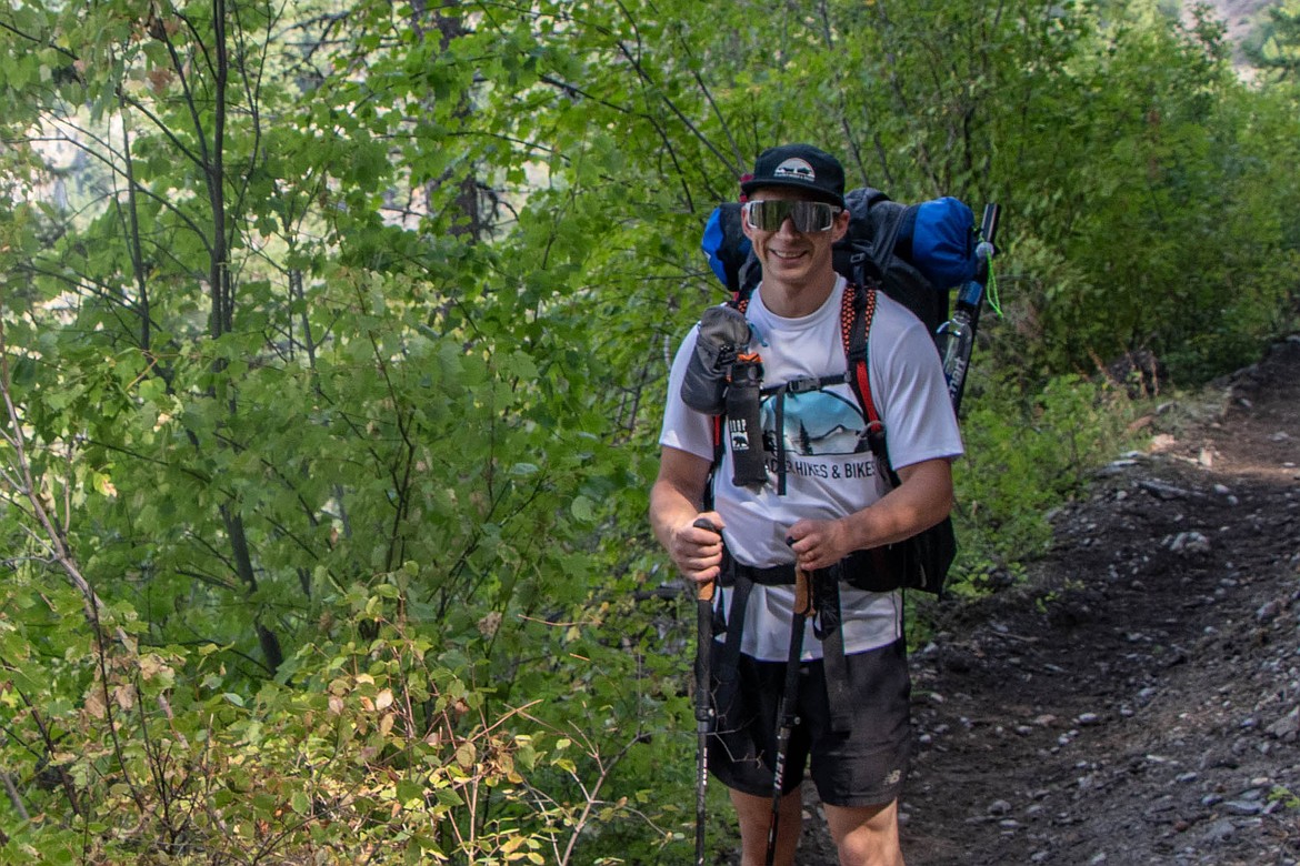 Brandon Phillips, owner of Glacier Hikes and Bikes, on an overnight pack raft trip around Holland Lake. (Kate Heston/Daily Inter Lake)