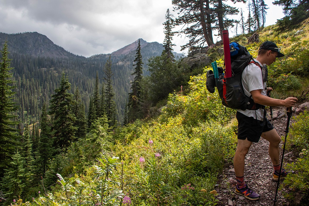 Brandon Phillips, owner of Glacier Hikes and Bikes, on an overnight pack raft trip around Holland Lake. (Kate Heston/Daily Inter Lake)